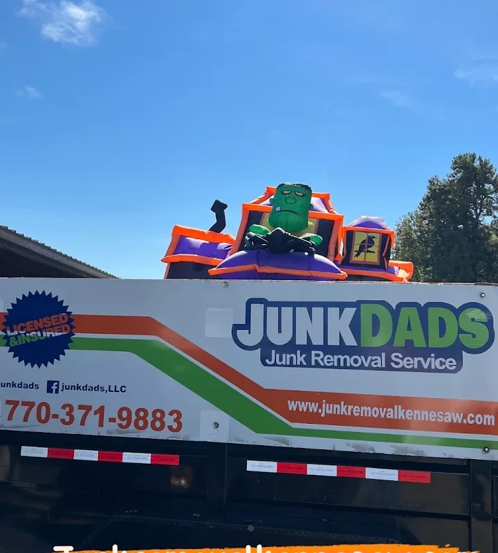 Junk Dads trailer hauling inflatable holiday decorations in Acworth, Georgia